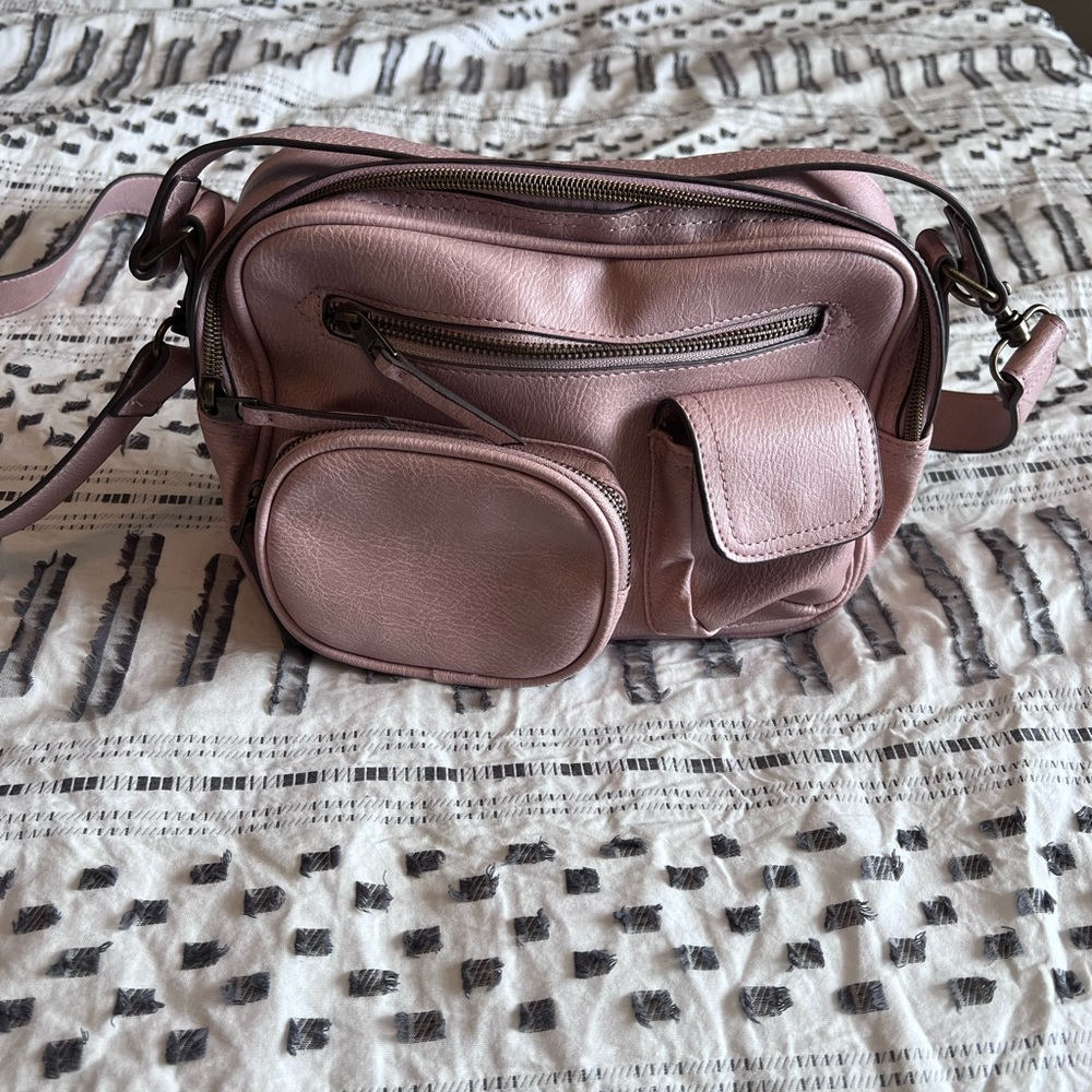 Light pink camera style bag